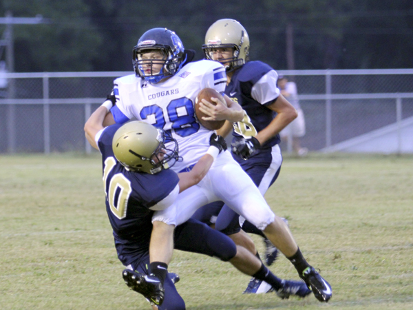 THE PRENTISS HEADLIGHT / Wesley Daughdrill making the stop for the Saints. (Photo by Jennifer Hall, www.photosbyjenny.zenfolio.com)