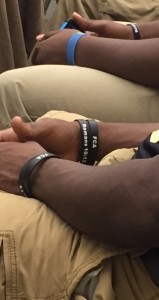 Holley Cochran / The Prentiss Headlight—One might think the Bassfield Yellowjackets only have football on their mind, but this photographer noticed something impressive at the school board meeting Tuesday. The players each had Fellowship of Christian Athletes bracelets on bearing Romans 10:13 -- "For everyone who calls on the name of the Lord will be saved." I would say these players are learning much more than just football.