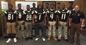 Holley Cochran / The Prentiss Headlight—Bassfield Yellowjacket Seniors were recognized at the school board meeting Tuesday night, along with their coach, for their exceptional talent both on the field and in the classroom. 