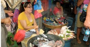 The Prentiss Headlight / The Whiteand Team visited a tradition Nicaraguan local market featuring fresh meat including chickens and fish sold open-air style.