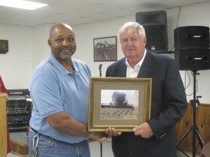 The Prentiss Headlight / Mr. Milton Thompson being presented the 2015 Outstanding Conservationist Award by JDC SWCD Chairman Herman Dungan.
