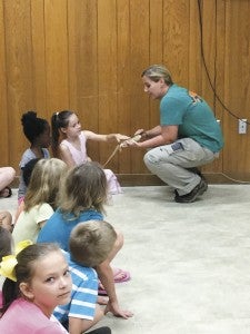 The Prentiss Headlight—Those who attended the first Summer Reading program at Bassfield were treated to interact with animals from the Hattiesburg Zoo.