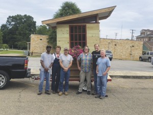 Holley Cochran / The Prentiss Headlight—The very first Tiny House Life Space garden shed rolled off the assembly line last week. The shed is made of reclaimed materials including the window from the original Belhaven College in Jackson. This garden shed retails for $3300 dollars and will be donated to Unity in the Community. Unity will be selling chances to win the shed, with all proceeds going to Unity in the Community. Chances are $5 each or 3 for $10. See any Unity member for chances or contact Dianna Hutchinson at 601-508-0590 for more information.